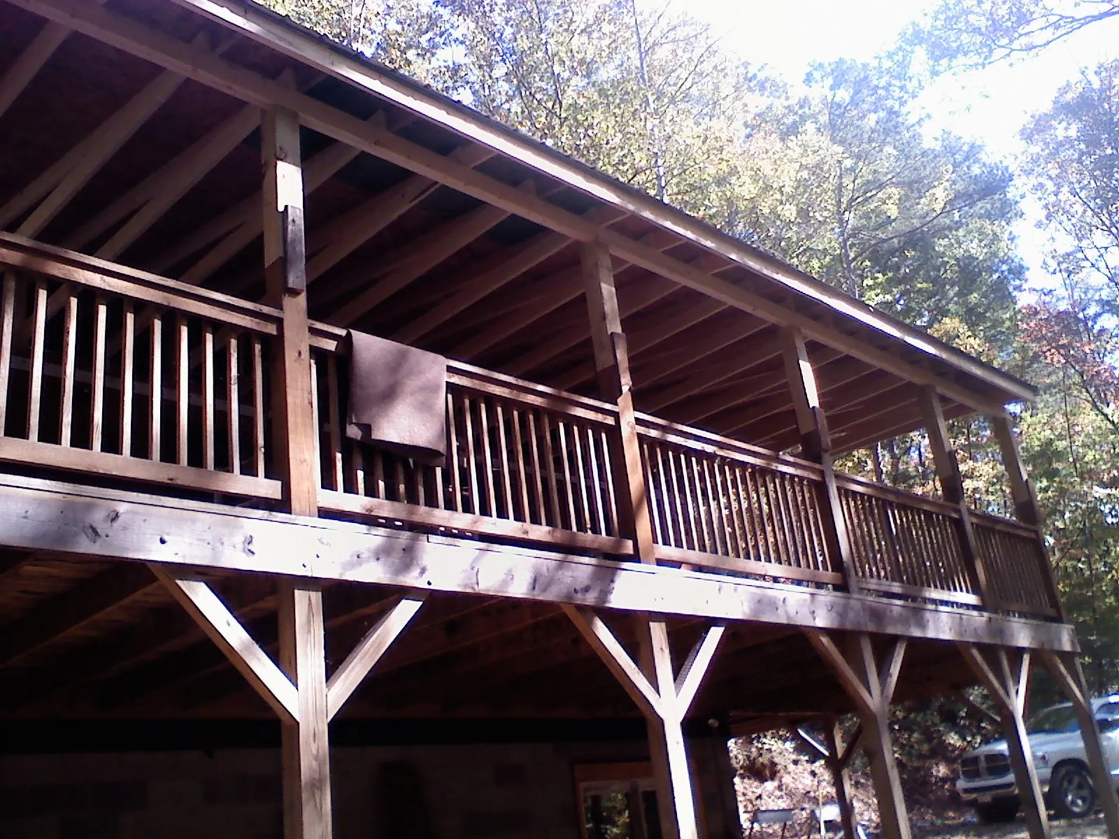 Timber framing under a new elevated porch and deck — Roof Leak Repair in North Berwick by Roofing Brothers